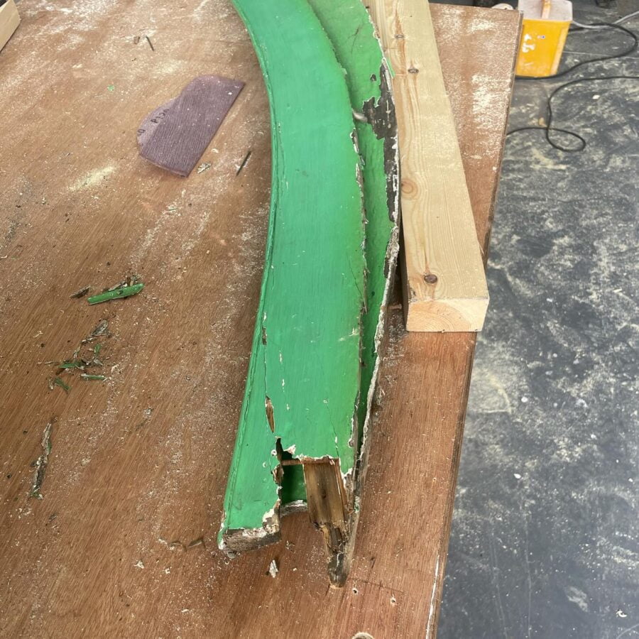 Damaged wooden board on workbench